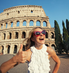 Woman on the background of the Colosseum