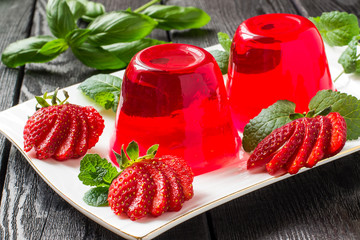 Strawberry jelly and ripe strawberries