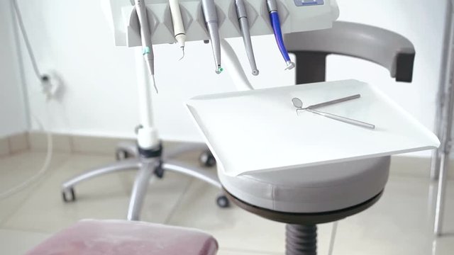 Modern dental tools, many instrument, chair