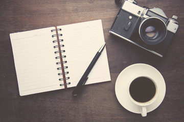 Fototapeta premium notebook,pen,coffee and camera