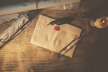 Old feather, envelope, sealing wax