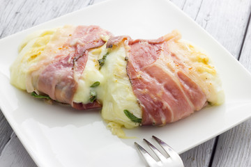 Tomino cheese with bacon