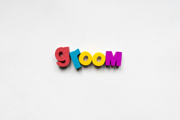 Making the word "groom" using colorful letters.