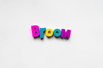 Making the word "Broom" using colorful letters.
