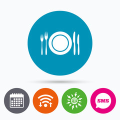 Plate dish with forks and knifes.