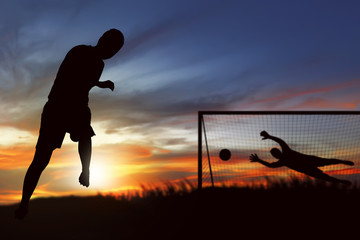 Silhouette of soccer player ready to execute penalty kick