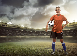 Woman holding soccer ball