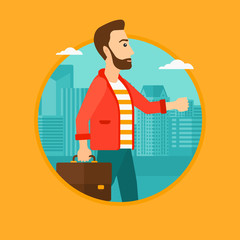 Successful businessman walking with briefcase.