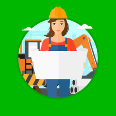 Engineer watching a blueprint.