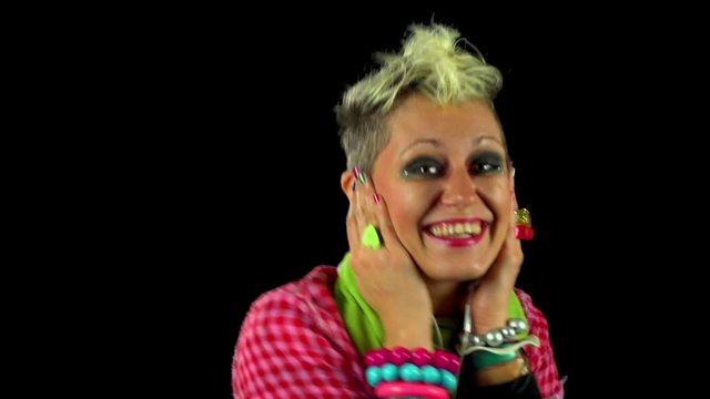 Eccentric woman dancing in color	