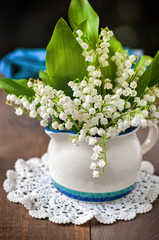 Bouquet of Lily of the valley flowers, selective focus, toned image