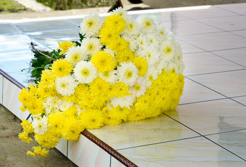 Bouquet of chrysanthemums on the doorstep