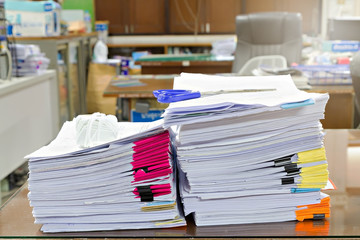 Close up of business documents stack on desk , report papers stack