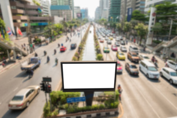 Blank billboard on road/effect blurred background.