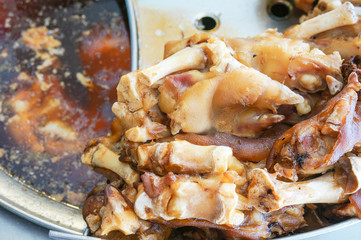 Stewed pork legs on steaming pot, thai style food