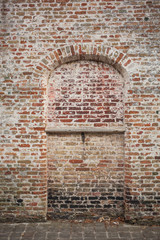 bow window on brick wall