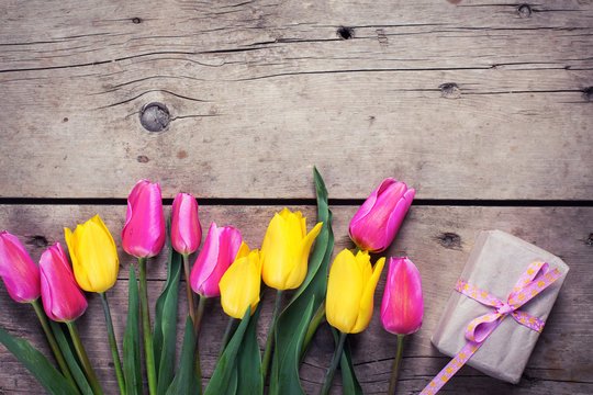 Border From Bright Yellow And Pink Spring Tulips And Box With Pr