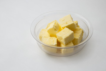 butter on a transparent plate