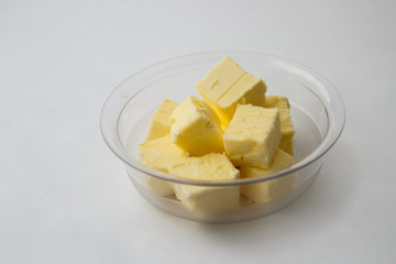 butter on a transparent plate