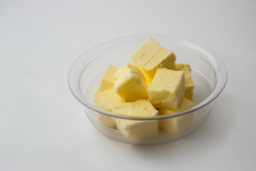 butter on a transparent plate