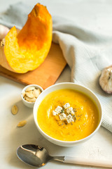 pumpkin soup with cheese and herbs