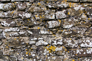 Close up of an old rustic looking stone wall
