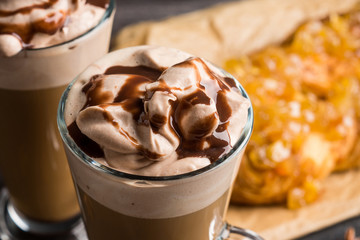 Apple strudel on the rustic wooden background. Shallow depth of field.
