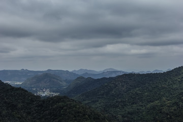 Obraz na płótnie Canvas mountain peak landscape with clouds and rain.