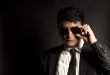 Business man in suit with sunglasses