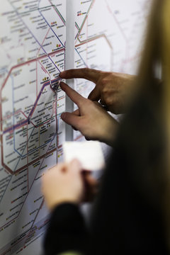Hands on subway map, Berlin, Germany