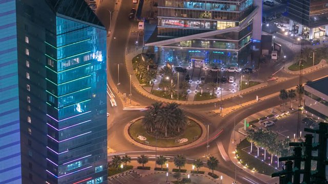 Skyline with Skyscrapers night timelapse in Kuwait City downtown illuminated at dusk. Kuwait City, Middle East