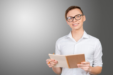 Handsome thoughtful man reading a note