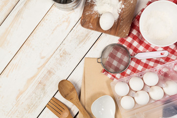baking preparation, top view of a variety of baking utensils and ingredients