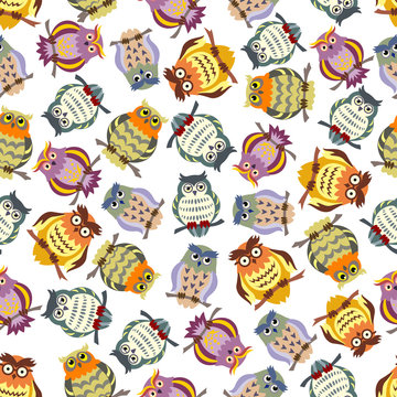 Cartoon colorful owls seamless pattern background