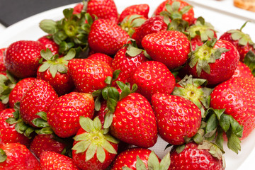 stock of fresh strawberry on plate