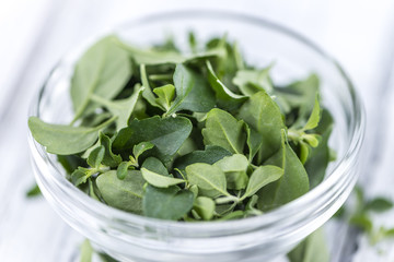 Menthol leaves on wooden background