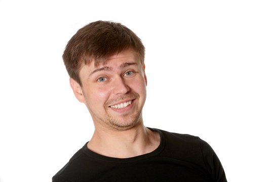 Young man with manic insincere smile, isolated on white