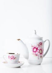 Cup of tea with teapot in vintage style