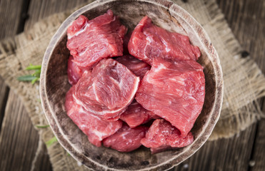 Wooden table with Chopped Beef fillet
