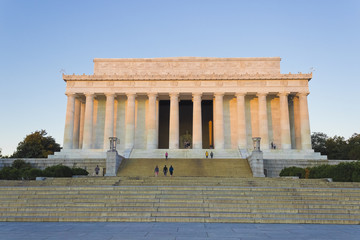 Early morning sunshine beginning to show on the eastern facade of the Lincoln Memorial, National Mall, Washington DC