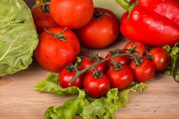 Fototapeta na wymiar Tomatoes, cabbage, pepper and salad