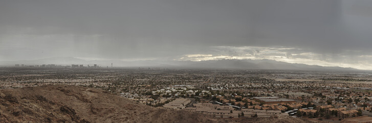 Las Vegas Aerial Panorama with city skyline, mountain and streets.