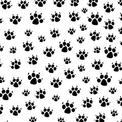 Fototapeta na wymiar vector dog foot prints background pattern