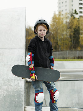 Boy with skateboard, Stockholm, Sweden