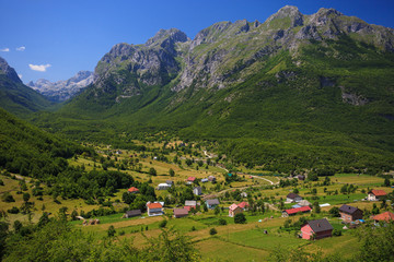 Fototapeta na wymiar Panoramic view of Vusanje village and Ropojana valley in Prokletije National park, Montenegro