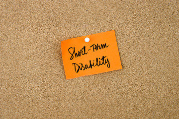 Short Term Disability written on orange paper note