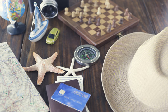 hat, chessboard, compass, passport, credit card, banknote, globe