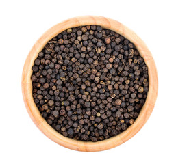 peppercorn in wood bowl isolated on white background