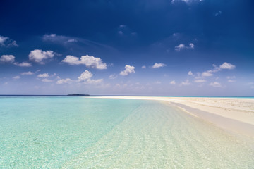 tropical beach with crystal clear water and white sand