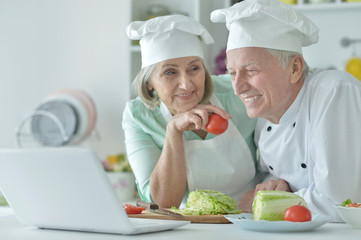 Senior couple at kitchen 